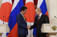Abe, Putin agree to boost progress on peace treaty, increase trade