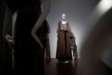 Catherine Deneuve gets $1 million in Saint Laurent gown auction