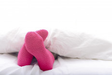 Wearing socks in bed may help you sleep better, study suggests