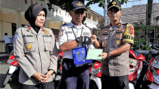 Tidying up with Slamet: Security guard goes viral for sparking joy over lines of motorcycles