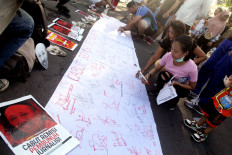 On National Press Day, Jokowi reverses decision to commute life sentence of journalist killer