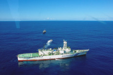 This picture taken by Japan Coast Guard on October 27, 2014 shows Chinese fishing boat Zheling Yuyun 622 seen behind Japanese Coast Guard vessel at Japan's exclusive economic zone near Ogasawara islands, 1,000km south of Tokyo. Japan Coast Guard arrested a Chinese captain on suspicion of coral poaching after a high seas chase in the country's exclusive economic zone, amid strained relations between the Asian giants. The ship's dozen-member crew was suspected of poaching corals, after about 100 Chinese boats were seen the area. Japanese media reports said there has been a swell in the number of Chinese fishing boats suspected of hunting red corals, highly prized in China as jewelry since last month in waters off the Ogasawaras. 