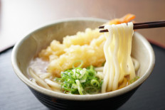 Udon noodle soup with tempura prawn