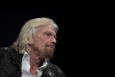 Richard Branson says he'll fly to space by July