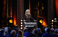 Country singer Dolly Parton raises laughs at charity awards gala