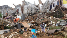 Burst dam in Bandung kills three