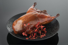 Peking duck with Tsar Imperial caviar at Hakkasan Jakarta