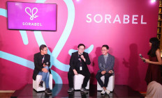 Fashion for &lsquo;sista&rsquo;: Co-founders of Sorabel Lingga Madu (left) and Jeffrey Yuwono (second left) and Indonesian fashion designer Barli Asmara (second right) introduce Sorabel, a fashion e-commerce company that provides fashion and beauty products to meet the desires of its customers, who are nicknamed &ldquo;sista&rdquo;. 