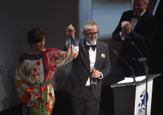 Italian chief Massimo Bottura (R) celebrates next to his wife Lara Gilmord after receiving the Best Restaurant award for his restaurant L'Osteria Francescana during the World's 50 Best Restaurants awards in Bilbao on June 19, 2018. 