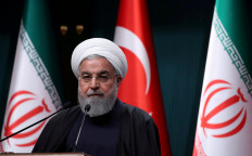 Iran's Rouhani blames US, Israel for attack on elite Guards: TV