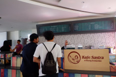 Hipster cafe: Visitors flock to Kafe Sastra, which is located in the lobby of publisher Balai Pustaka on Jl. Bunga in East Jakarta.