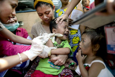 Philippines weighs re-use of controversial dengue vaccine