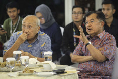 Jusuf Kalla (right).