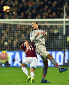 Suspended Van Dijk leaves gaping hole in Liverpool defence for Bayern visit