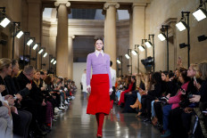 Beckham looks to '70s, Westwood turns catwalk into protest