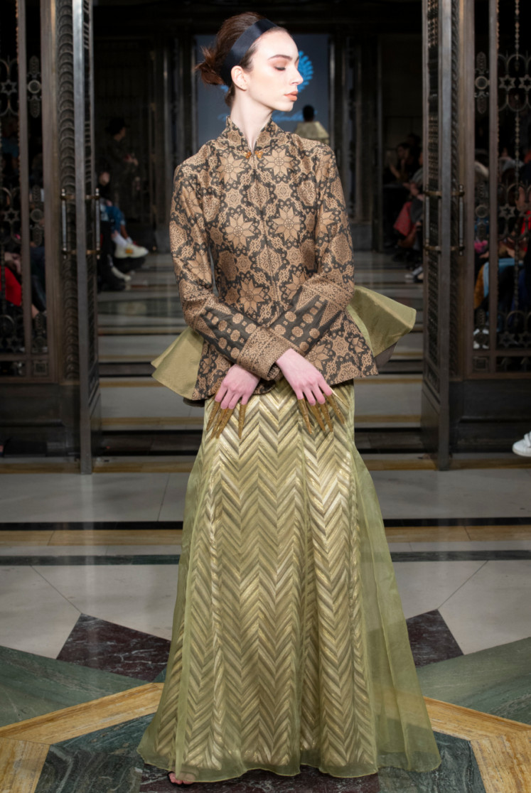 A model struts down the runway wearing a piece by Nila Baharuddin at the Indonesian Fashion Showcase in Fashion Scout Fashion Week Autumn/Winter 2019 on Saturday, Feb. 16 at the Freemason’s Hall in London.
