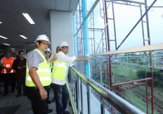 Transportation Minister Budi Karya Sumadi (right) and Transportation Ministry Railway Director General Zulfikri (left) visit the airport train station at Manggarai Station in Central Jakarta on Feb. 16, 2019.