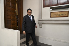 Ex-Goldman banker to finish Malaysia legal process before US extradition