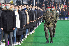 Compulsory service: South Korean soldiers inspect new military conscripts during an induction ceremony at the army training center in Nonsan on Jan. 14. United States President Donald Trump is due to meet the North’s Kim Jong-un in Hanoi for a high-profile summit to make progress on the denuclearisation of the peninsula and a possible peace treaty. (AFP/Jung Yeon-je ).
Usage: 0