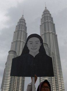 Ex-policeman in Malaysian murder case loses Australia asylum bid 