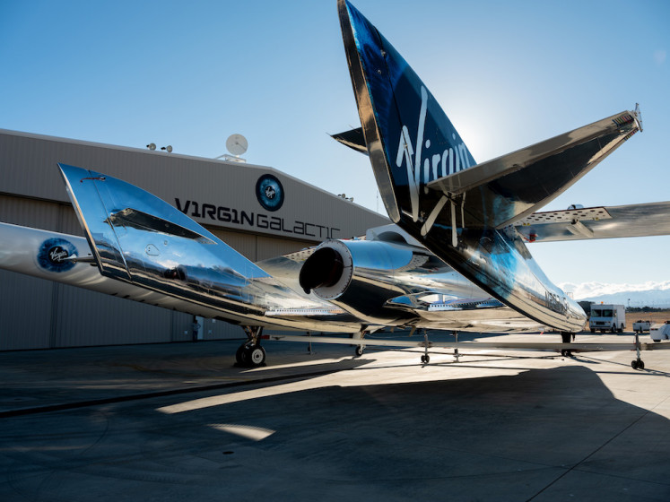 In this image courtesy of Virgin Galactic, SpaceShipTwo mates to the mothership, WhiteKnightTwo, at Mojave Space Port on February 19, 2019, in Mojave, California. The spacecraft of Virgin Galactic Space Travel Company has again crossed the border of space according to the US definition, 80 kilometers (50 miles) of altitude, during a test flight on February 22, 2019, in California, announced the billionaire company British Richard Branson.