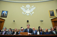 Ex-Trump lawyer brands US president a 'conman' and 'racist'