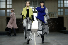 Issey Miyake fills school gym with kaleidoscope of colors in Paris