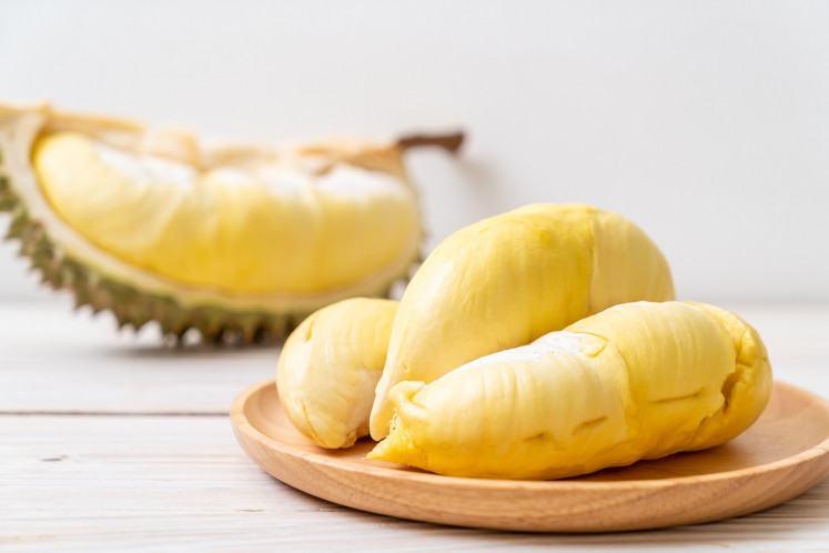 Fresh durian on wood background