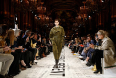 'Upcycled' fashion and Oprah star at Stella McCartney catwalk