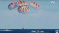 SpaceX capsule back on Earth, paving way for new manned US flights