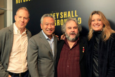 Warner studios head steps down after reported affair with actress