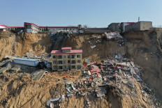 Death toll in China landslide rises to 20