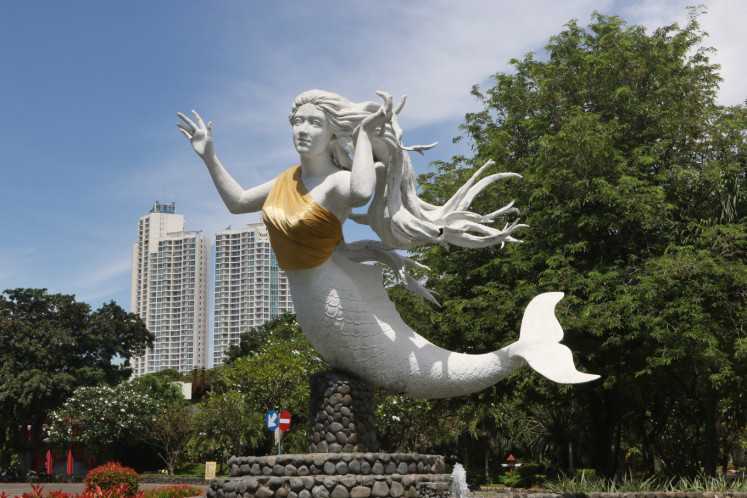 Ancol covers nude mermaid statues