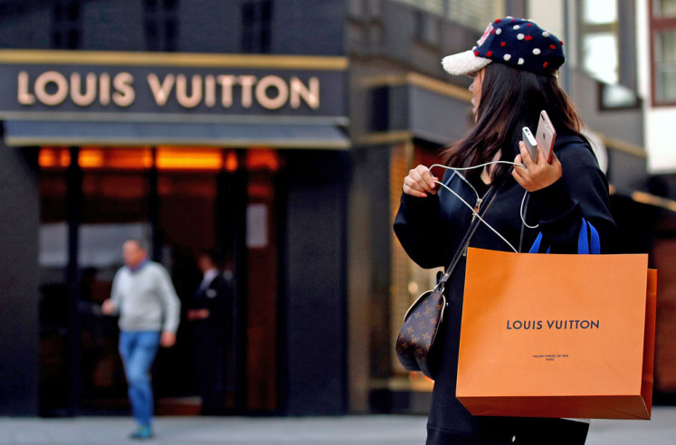 Louis Vuitton to Close Shops in China Amid Luxury Slowdown