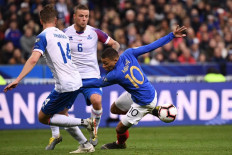 Mbappe leads France rout, Ronaldo injured in Portugal draw
