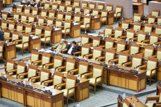 The House of Representatives is seen almost empty during a hearing in Jakarta.