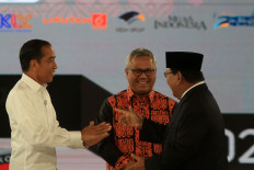 Presidential candidates Joko Widodo and Prabowo Subianto greet each other before the presidential debate held in the Shangri-La Hotel in Jakarta on March 30.