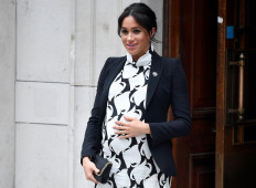 Britain's Meghan, Duchess of Sussex, leaves after an International Women's Day panel discussion at King's College London, in London, Britain, March 8, 2019. 