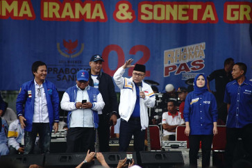 National Mandate Party (PAN) chairman Zulkifli Hasan speaks at an open-air political campaign on March 28, 2019 in Depok, West Java. PAN, which opposed President Joko Widodo's reelection bid in 2019, was welcomed into the governing coalition last week.