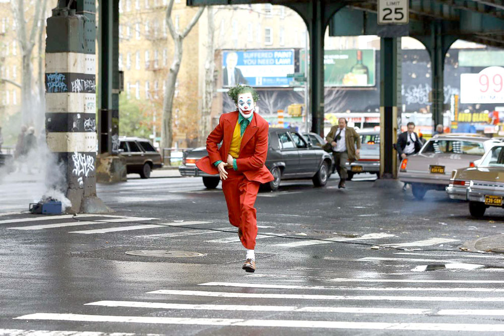 Clown prince of crime: Joaquin Phoenix plays as a failed stand-up comedian who is driven insane and becomes a psychopathic murderer known as Joker. 
