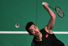 China's Lin Dan storms into Malaysia final