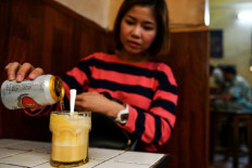 Frothed not fried: Hanoi's egg beer draws curious drinkers