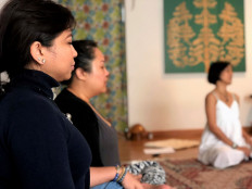 Fulfillment: Participants follow a program at Rumah Remedi to find inner peace through various healing practices.