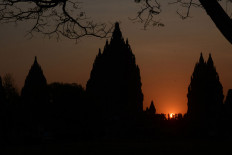 The spectacular Prambanan temple skyline during sunset in Yogyakarta. 