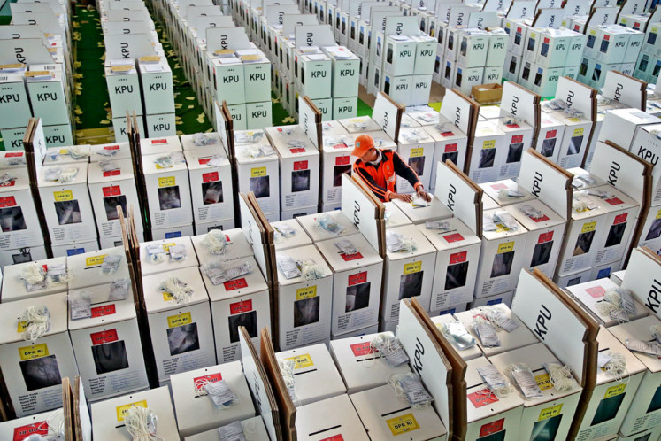 Ready for distribution: An official prepares ballot boxes at the Tanah Abang district branch of the General Elections Commission (KPU) in Jakarta in 2019.