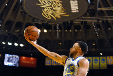 Stand by me: Stephen Curry of the Golden State Warriors goes to the basket against the LA Clippers during Game One of Round One of the 2019 NBA Playoffs on Saturday at the ORACLE Arena in Oakland, California. 