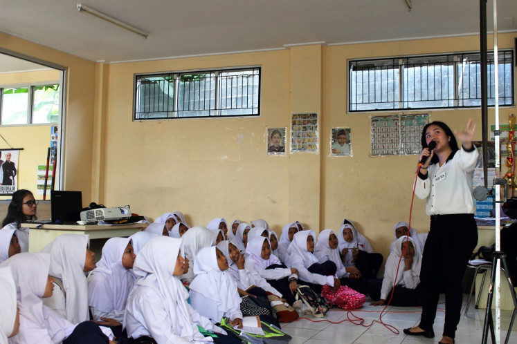All ears: Neira Ardaneshwari reaches out to school students and young people across Indonesia to raise awareness about reproductive health and youth issues
