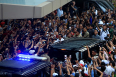 Jokowi calls for unity after bitter election battle    