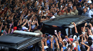 Jokowi calls for unity after bitter election battle