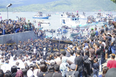 Millions in Indonesia peacefully celebrate Easter despite volatile politics 